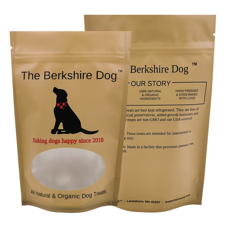 The Berkshire Dog treat packaging in a stand-up pouch with an oval window
